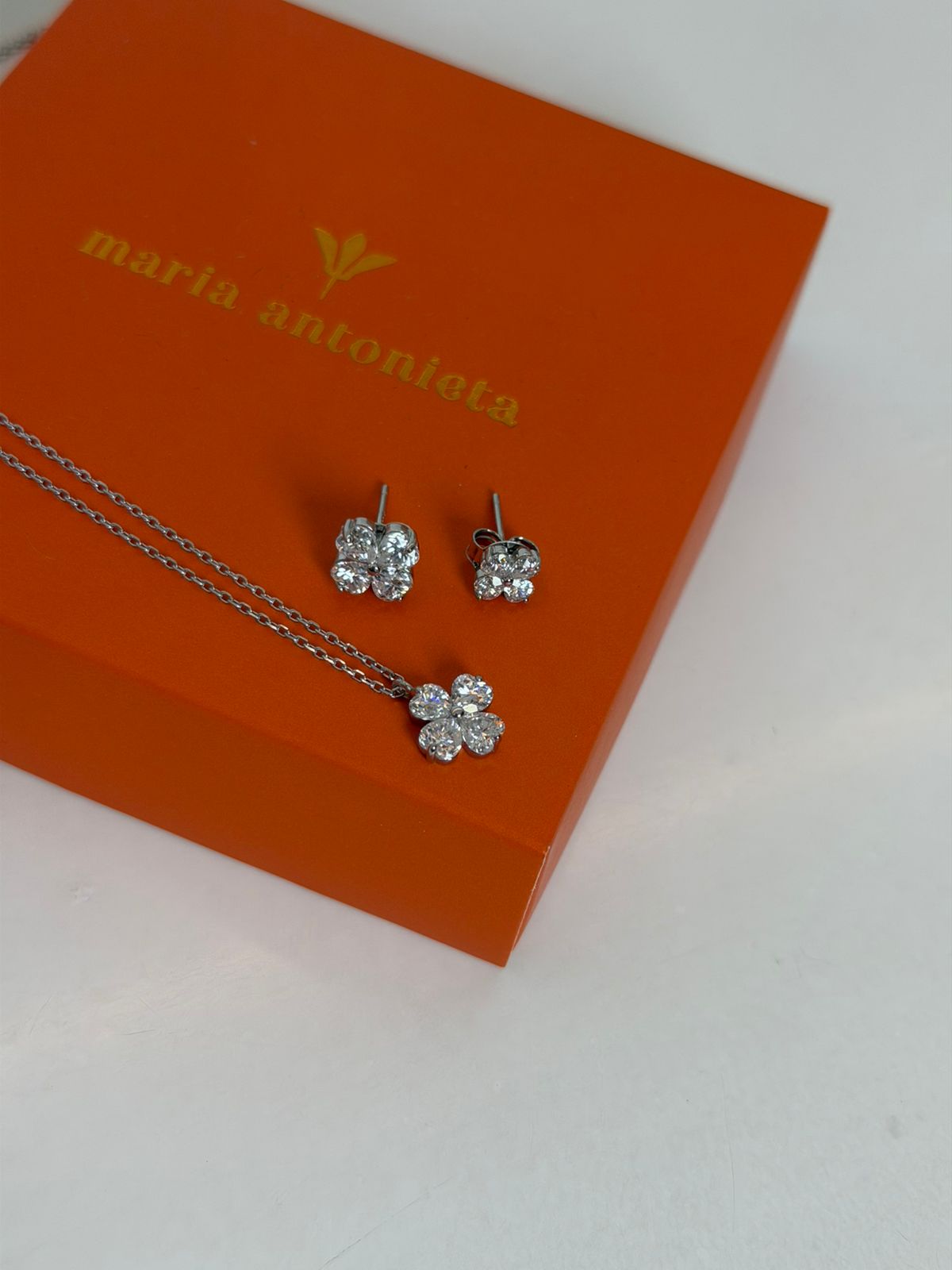 Conjunto de colar e brincos flor em prata, Conjuntos